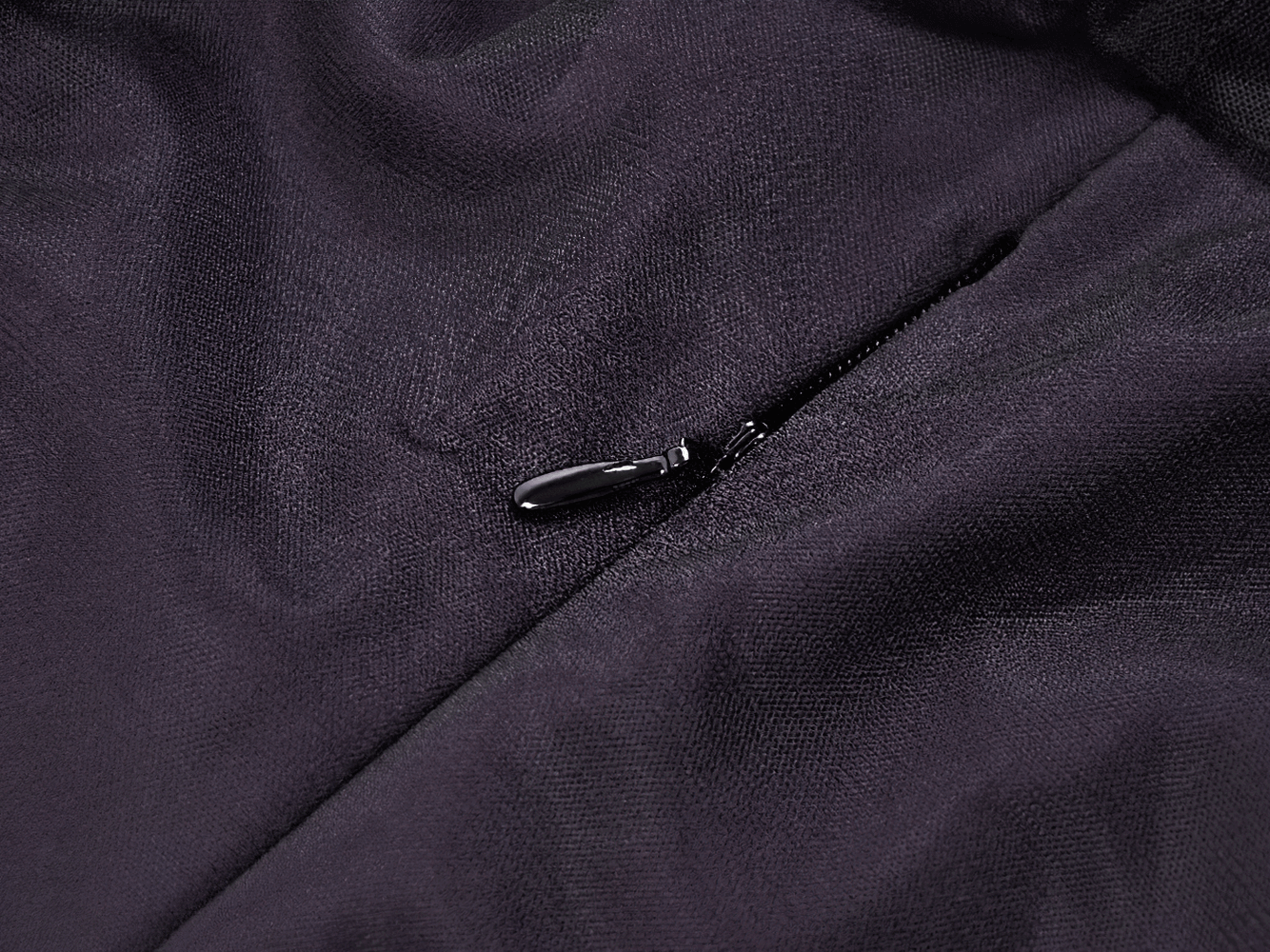 Close-up of the zip detail on the Purple and Black Gothic Mesh Dress with Lace Sleeves.