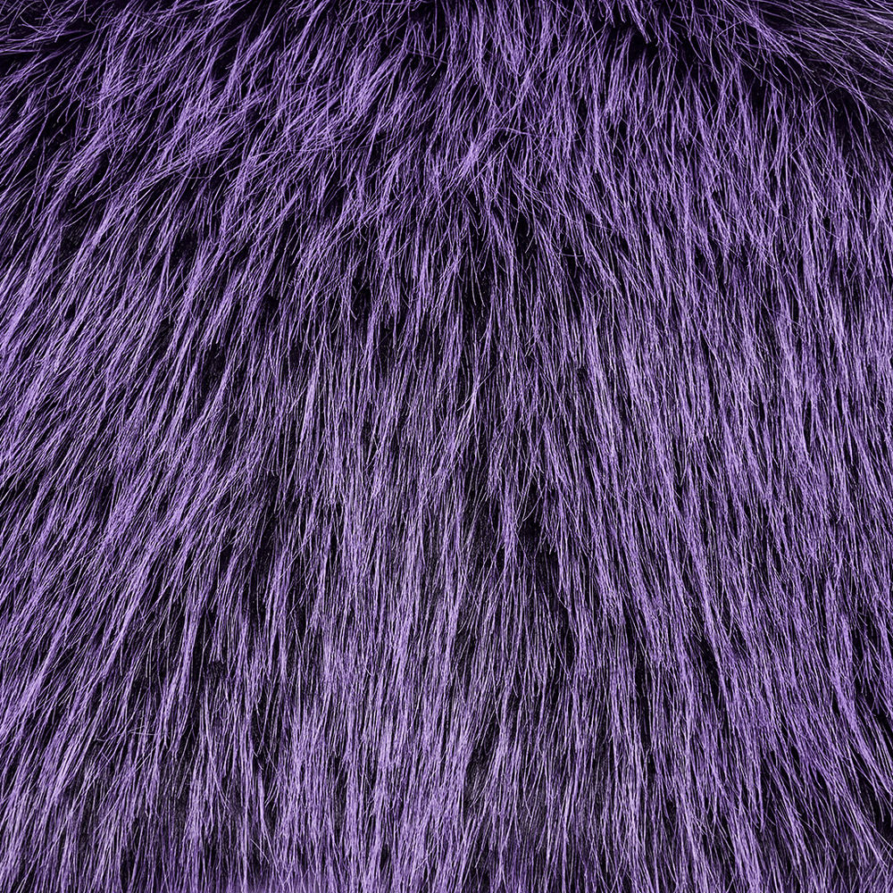 Close-up of luxurious purple faux fur with a soft, shaggy texture, perfect for adding drama to any outfit.