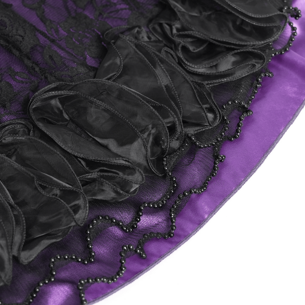 Close-up of the layered ruffle hem and lace details of the Purple Gothic Lace Corset Mini Dress with Ruffles.