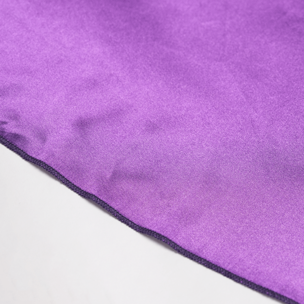 Close-up of the purple fabric showcasing the rich color and texture for the Purple Gothic Lace Corset Mini Dress with Ruffles.