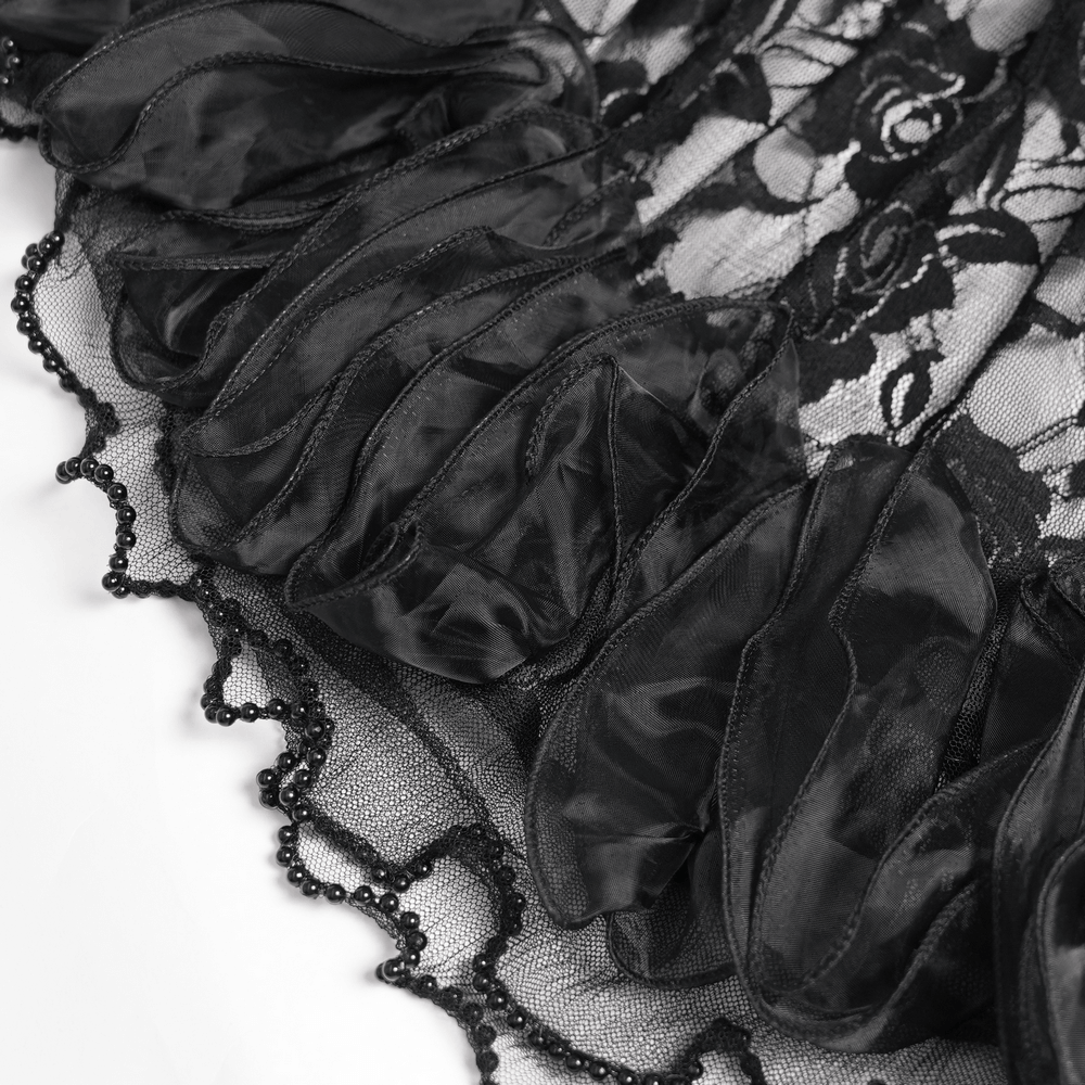 Detail of the lace and ruffled hem of the Purple Gothic Lace Corset Mini Dress with Ruffles.