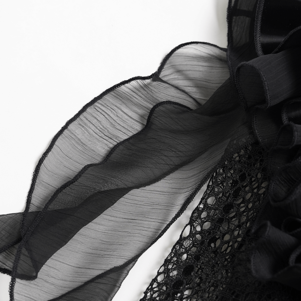 Detail of black ruffle tulle showcased in the Purple Gothic Lace-Up Dress with Black Ruffle Tulle, highlighting elegant texture.