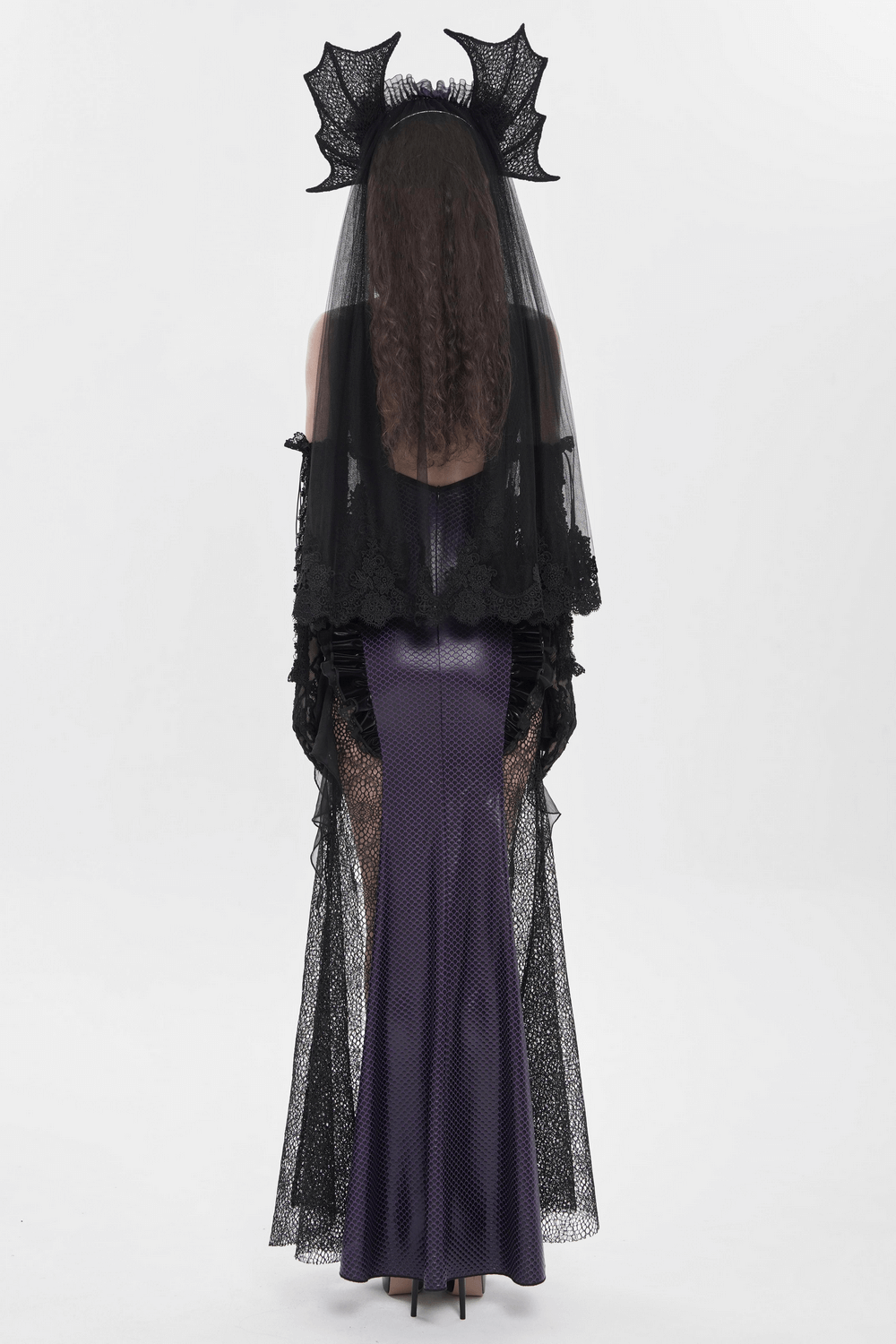 Back view of a model wearing a Purple Gothic Lace-Up Dress with Black Ruffle Tulle and a dramatic black veil.