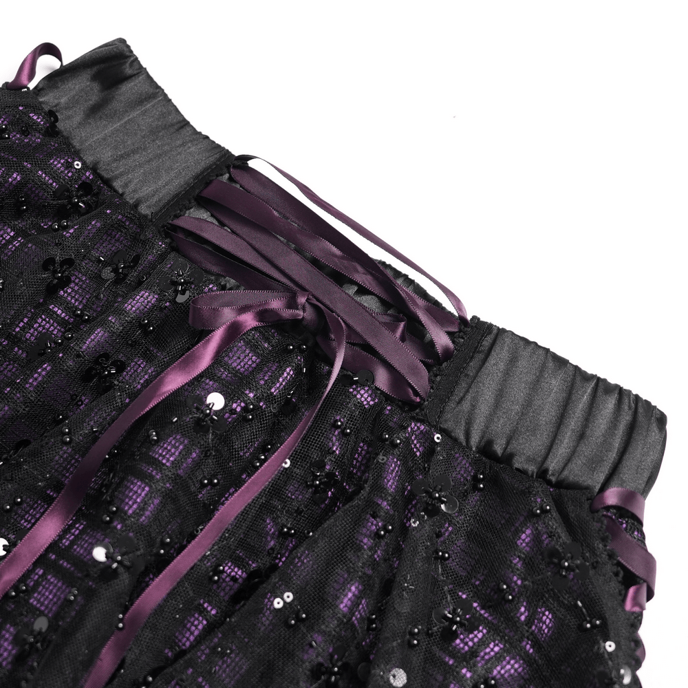 Close-up of the Purple Gothic Tulle Skirt with Lace Up Ribbon Trim, featuring purple plaid and black sequin mesh.