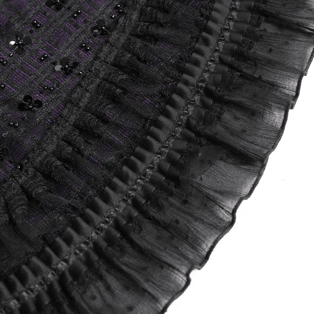 Close-up of the Purple Gothic Tulle Skirt with Lace Up Ribbon Trim showcasing the black ruffled hem and sequin details.