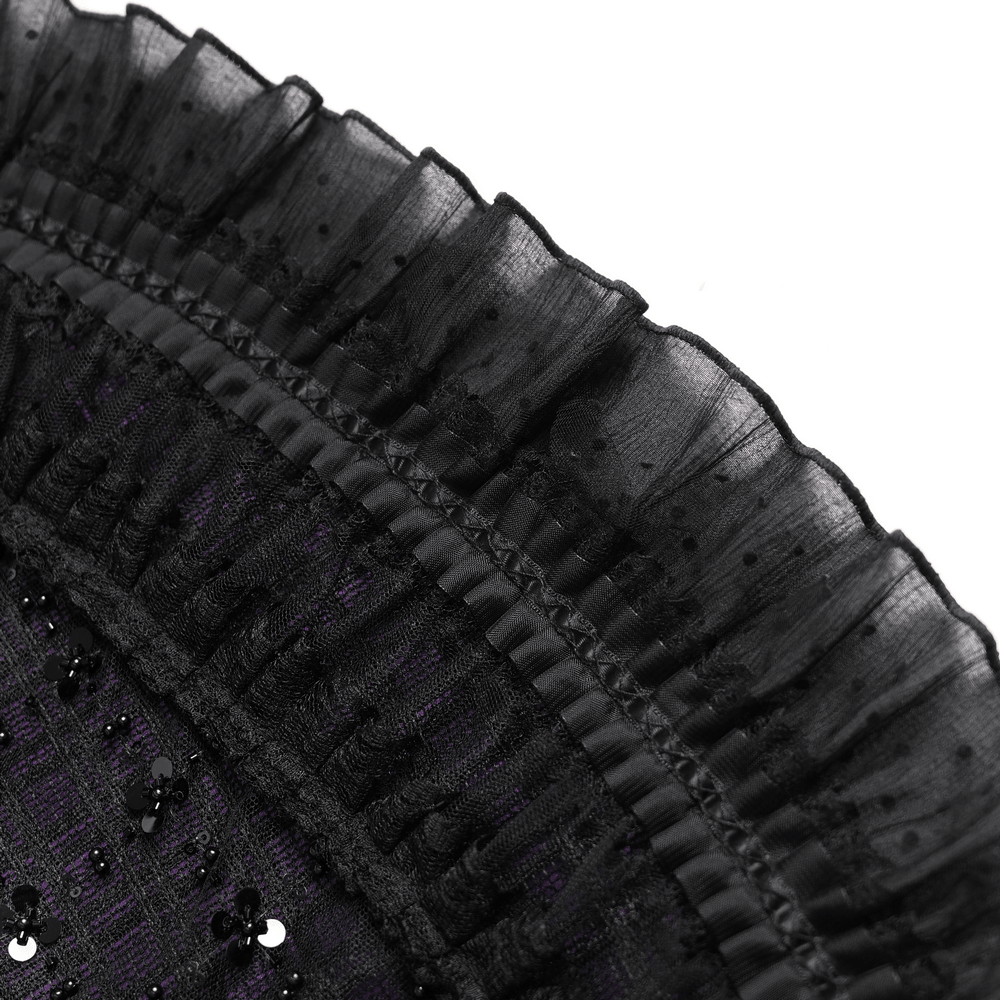 Close-up of the ruffled hem of the Purple Gothic Tulle Skirt with Lace Up Ribbon Trim, featuring black mesh and sequins.