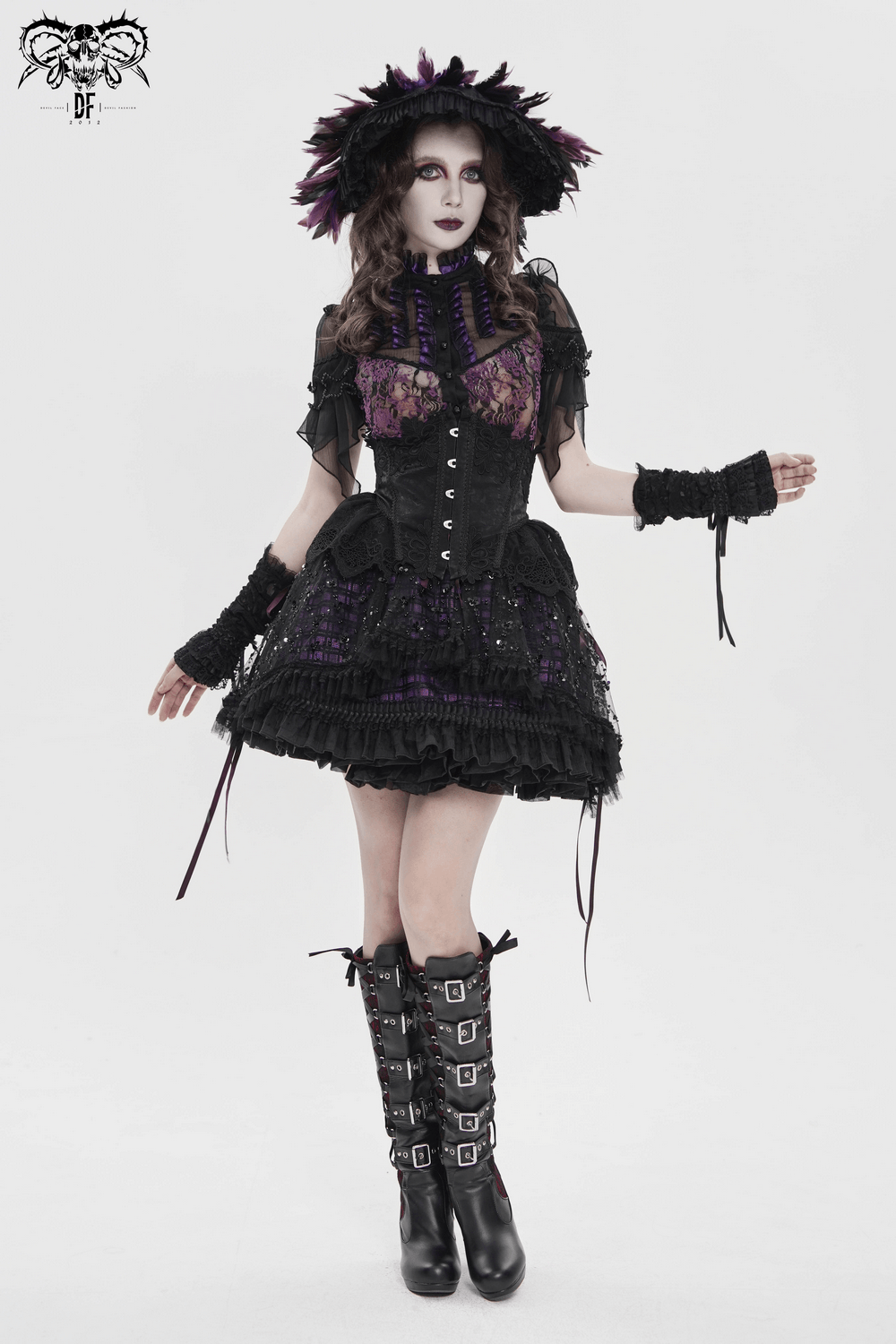 Purple Gothic Tulle Skirt with Lace Up Ribbon Trim styled with a dramatic black outfit and accessories.