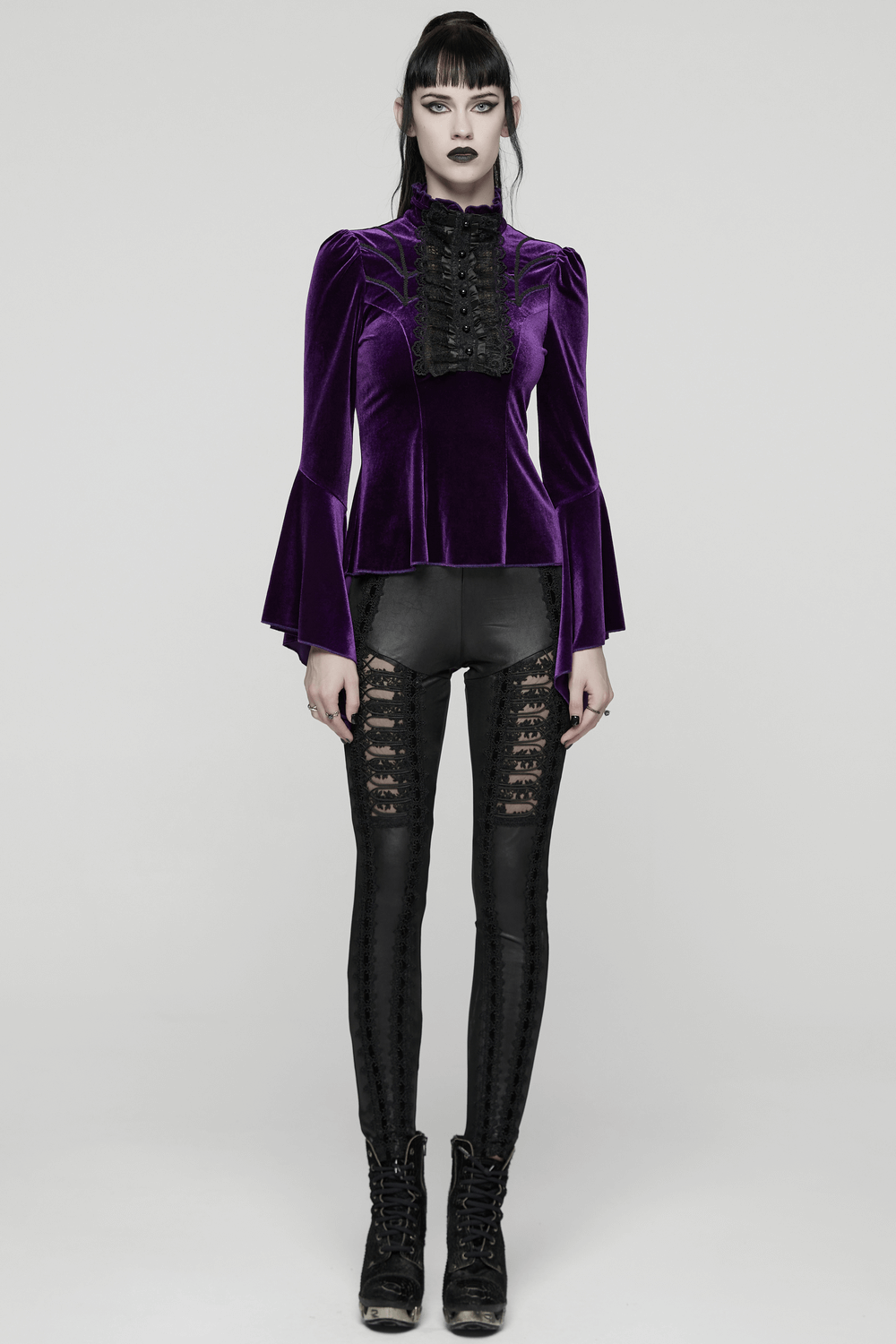 Purple Gothic Velvet Top with Lace and Flared Sleeves worn by model, showcasing elegance and gothic style.