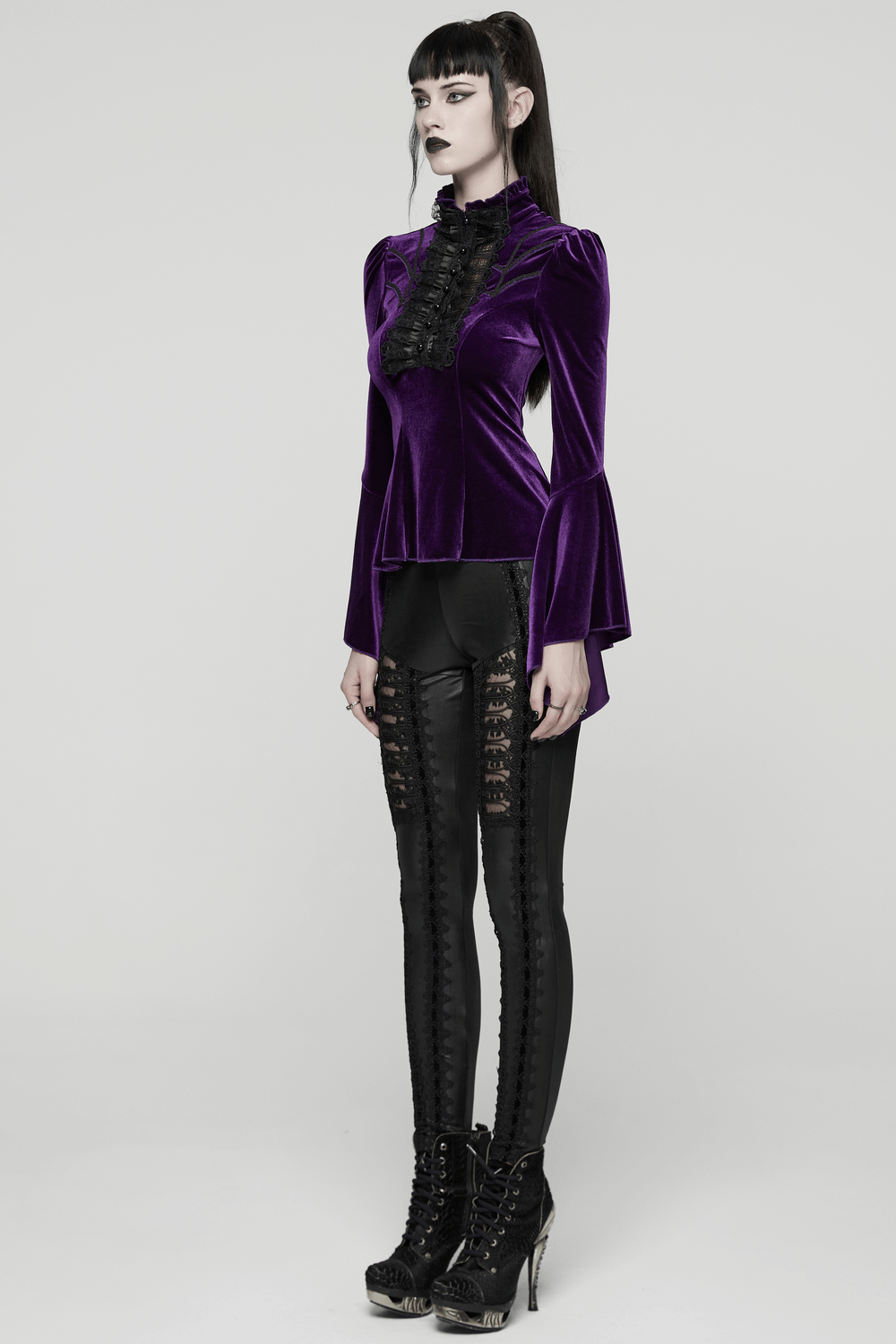 Purple Gothic Velvet Top with Lace and Flared Sleeves worn by a model in a dramatic pose.