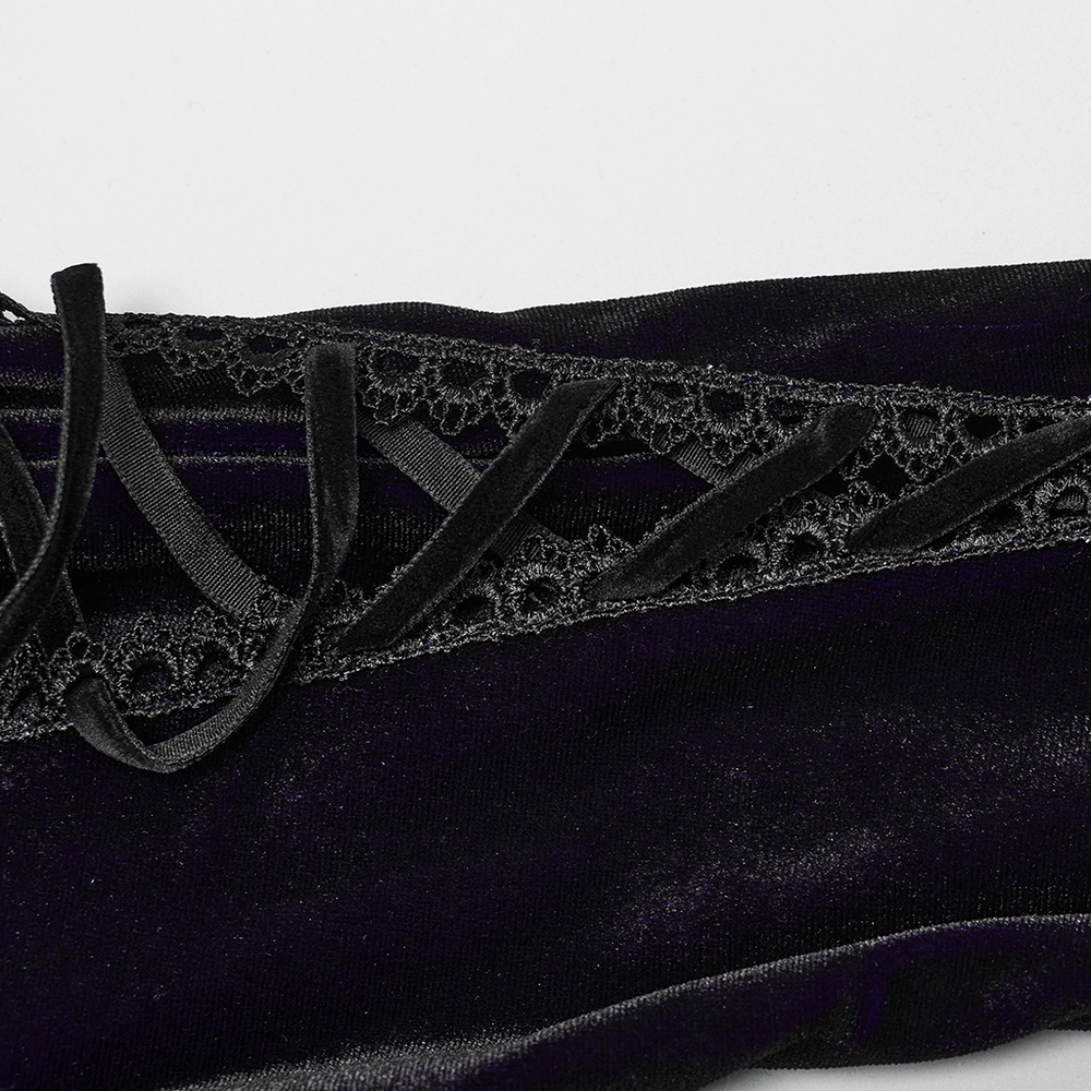 Lace detailing on purple velvet Gothic dress with ribbons, showcasing intricate design and soft texture.