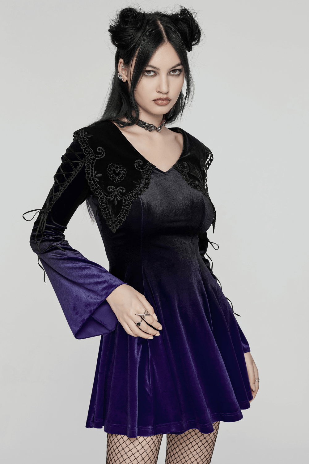 Purple gradient velvet Gothic dress with lace details, heart collar, and flared sleeves worn by model.