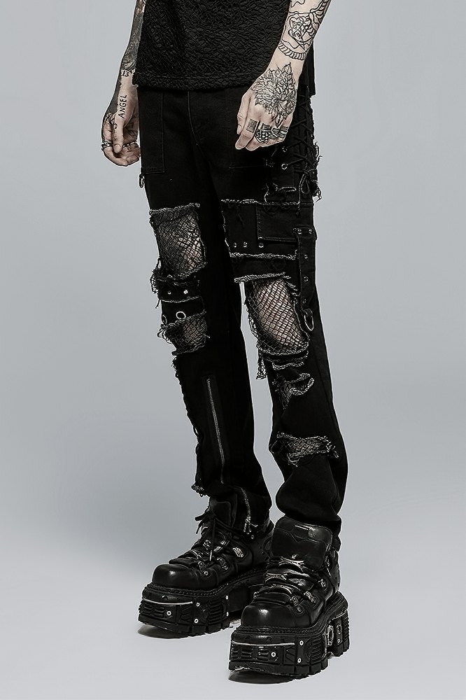 Edgy punk denim trousers with mesh detail, ragged accents and bold style, perfect for the rebellious fashionista.