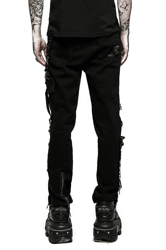 Back view of edgy black ragged denim trousers with mesh details, perfect for punk fashion enthusiasts.