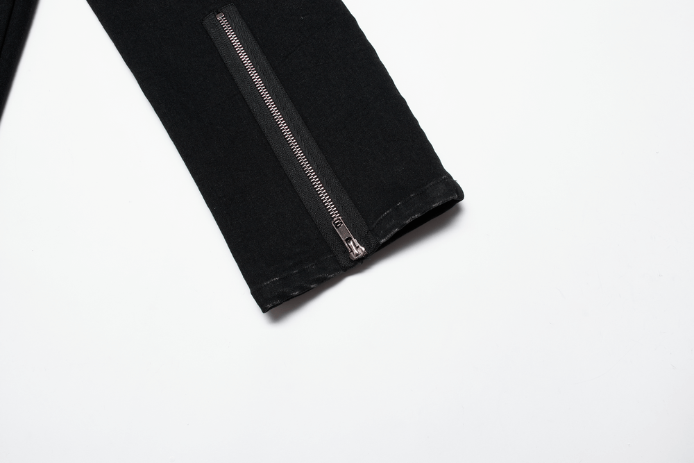 Close-up of black denim trousers featuring a stylish zipper detail, showcasing edgy punk fashion.