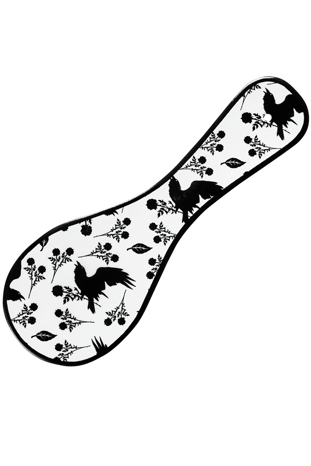 Raven and Rose spoon rest with gothic design, featuring black raven and floral patterns on white ceramic.