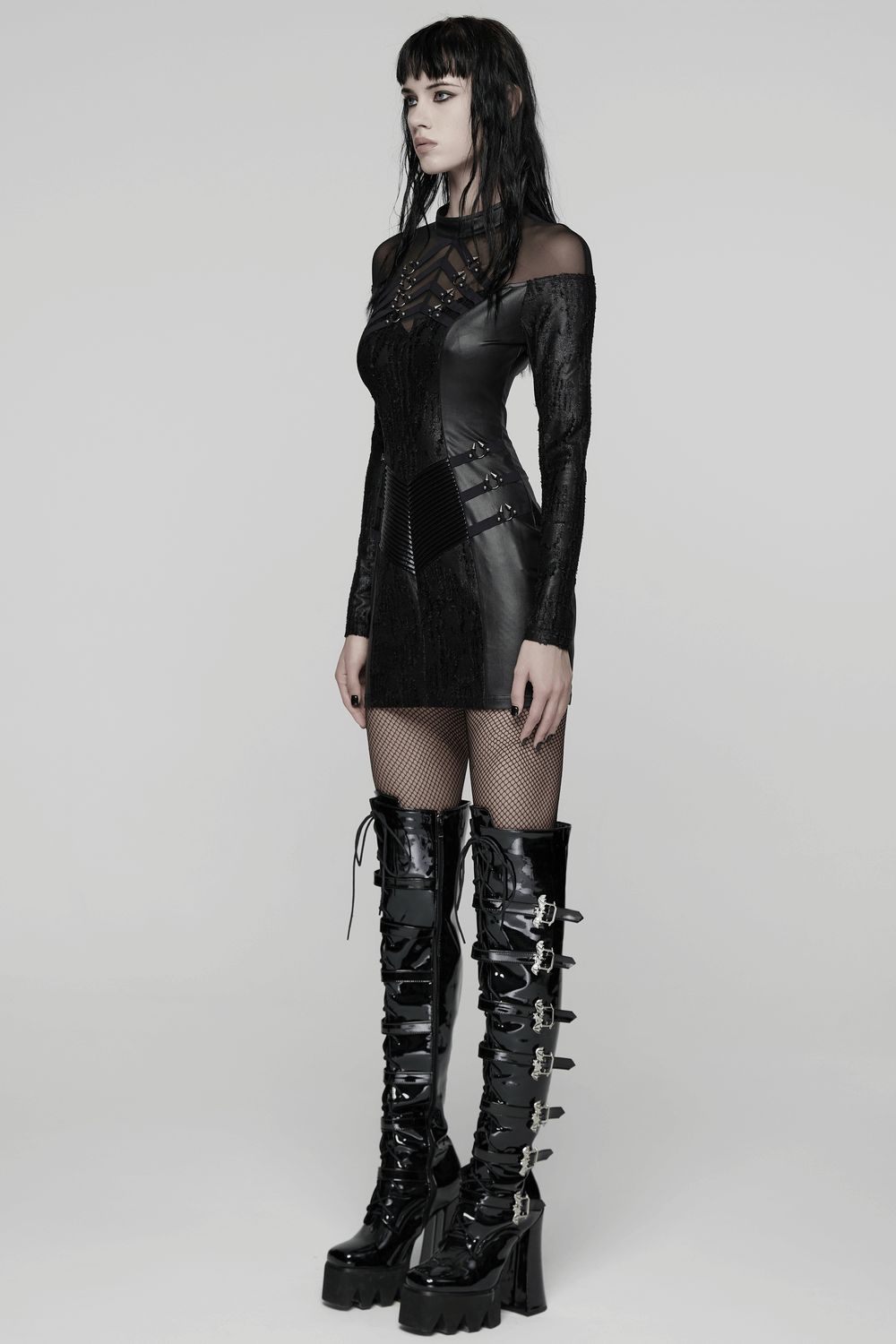 Rebellious Punk Dress with Fish Scale and Mesh Detailing showcasing striking metal rings and edgy styling.