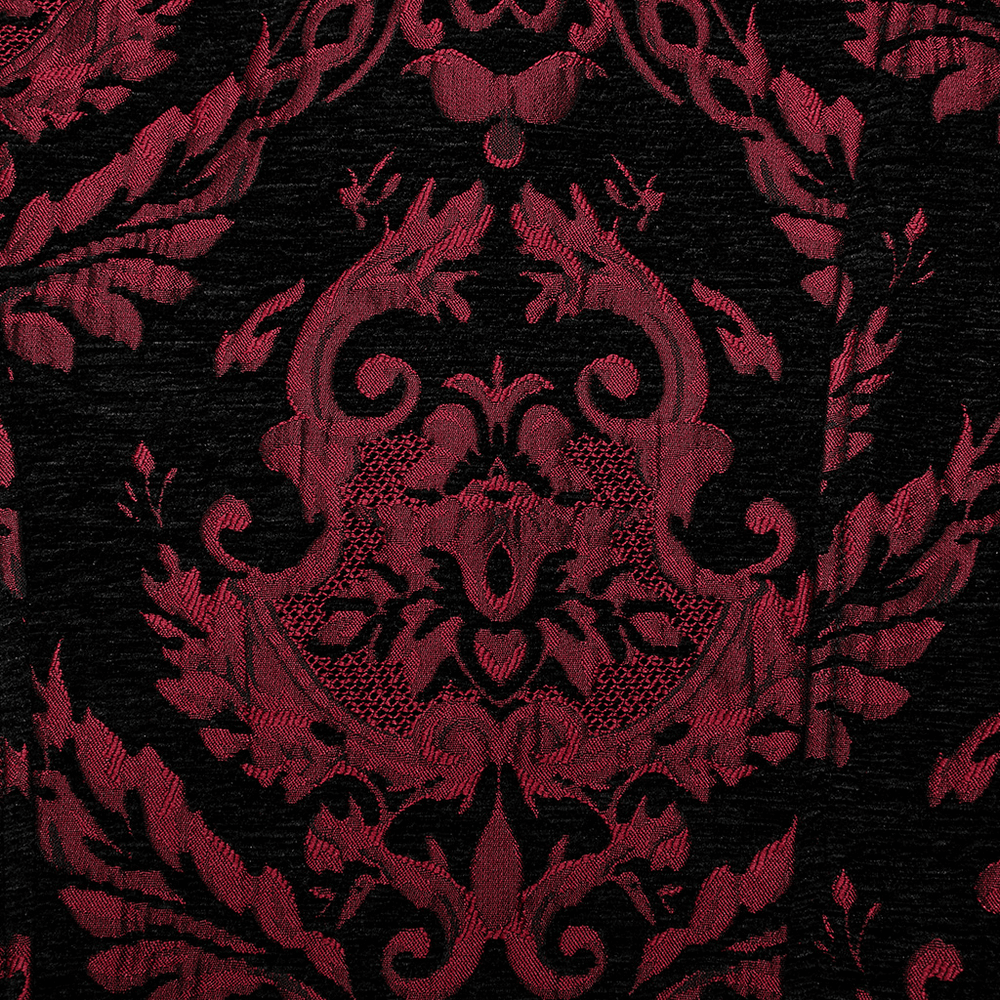Close-up of rich red and black jacquard fabric featuring an ornate gothic floral pattern, perfect for Victorian-inspired designs.