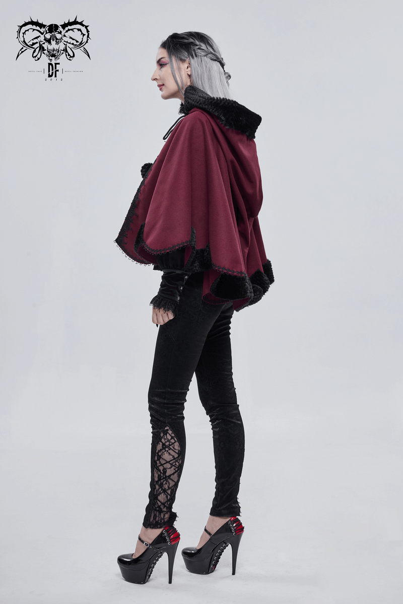 Gothic red hooded cape with black fur and pompons, worn by a stylish woman in black leggings and high heels.