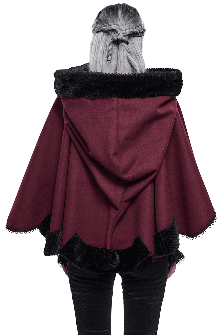 Back view of a stylish red hooded cloak with black fur trim and pompons, perfect for gothic fashion enthusiasts.