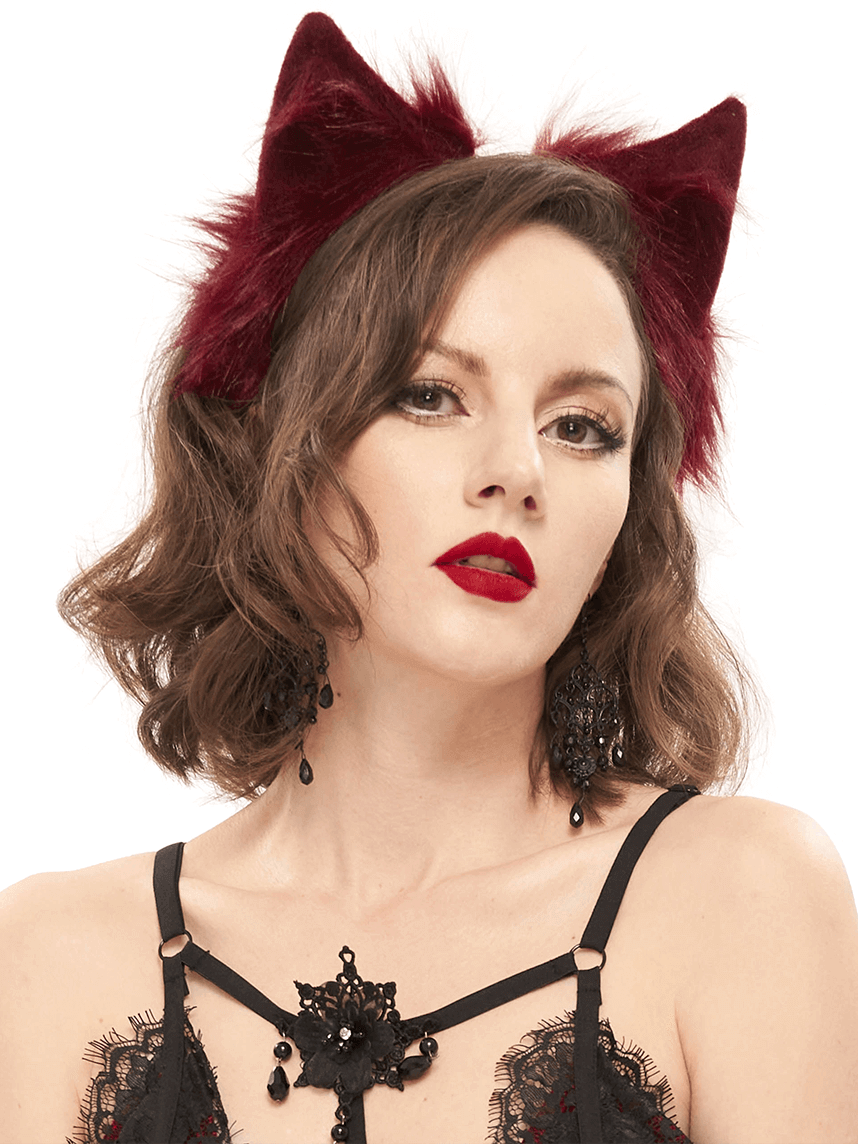 Red faux fur cat ear headband worn by a model, perfect gothic accessory for stylish women's outfits.
