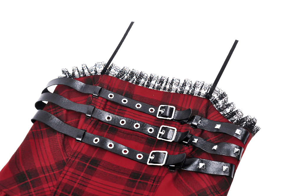 Close-up of a red plaid gothic mini dress featuring buckle straps and lace trim details for a punk-inspired look.