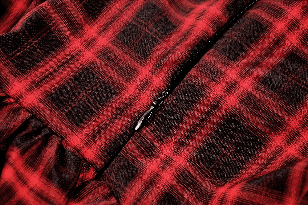 Red Plaid Punk Mini Dress with Tiered Ruffles close-up showing the textured plaid fabric and ruffle details.
