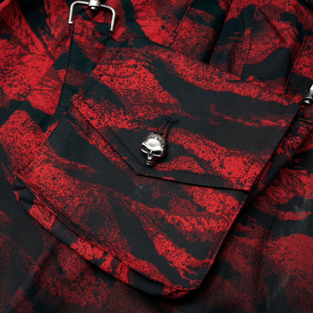 Close-up of red abstract print fabric with removable waist bag and metal buckle details on punk A-line skirt.