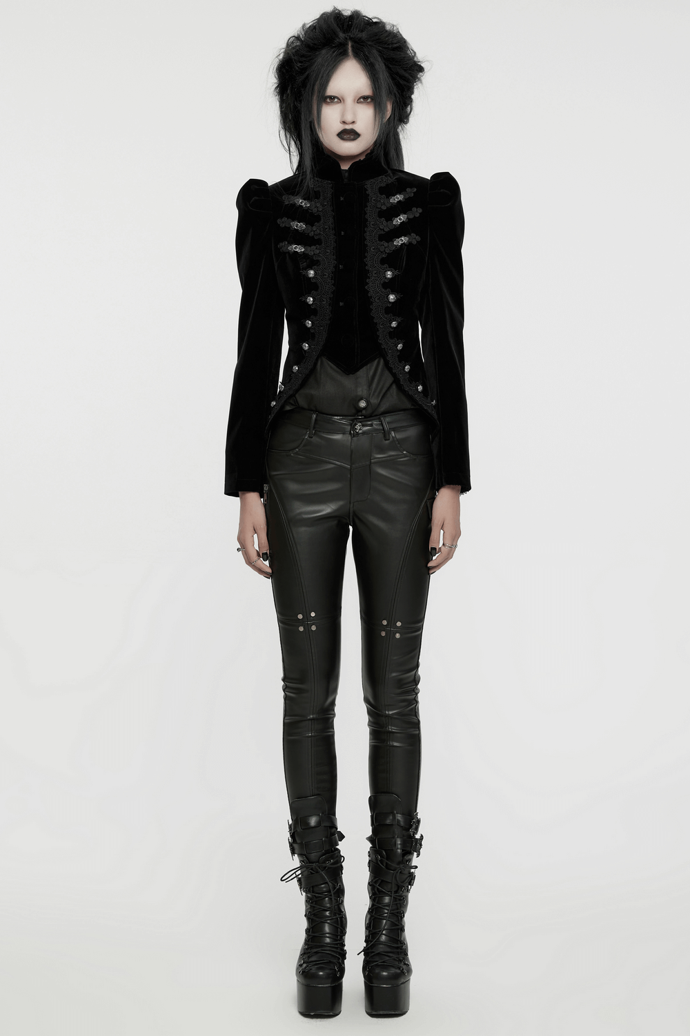 Gothic velvet stand collar black jacket with lace and buttons worn by a model, exuding dark elegance and sophistication.