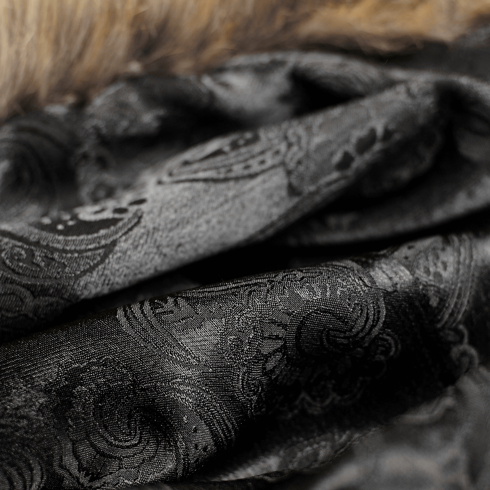 Close-up of luxurious black fabric with ornate patterns, showcasing rich texture and elegance of Gothic design.