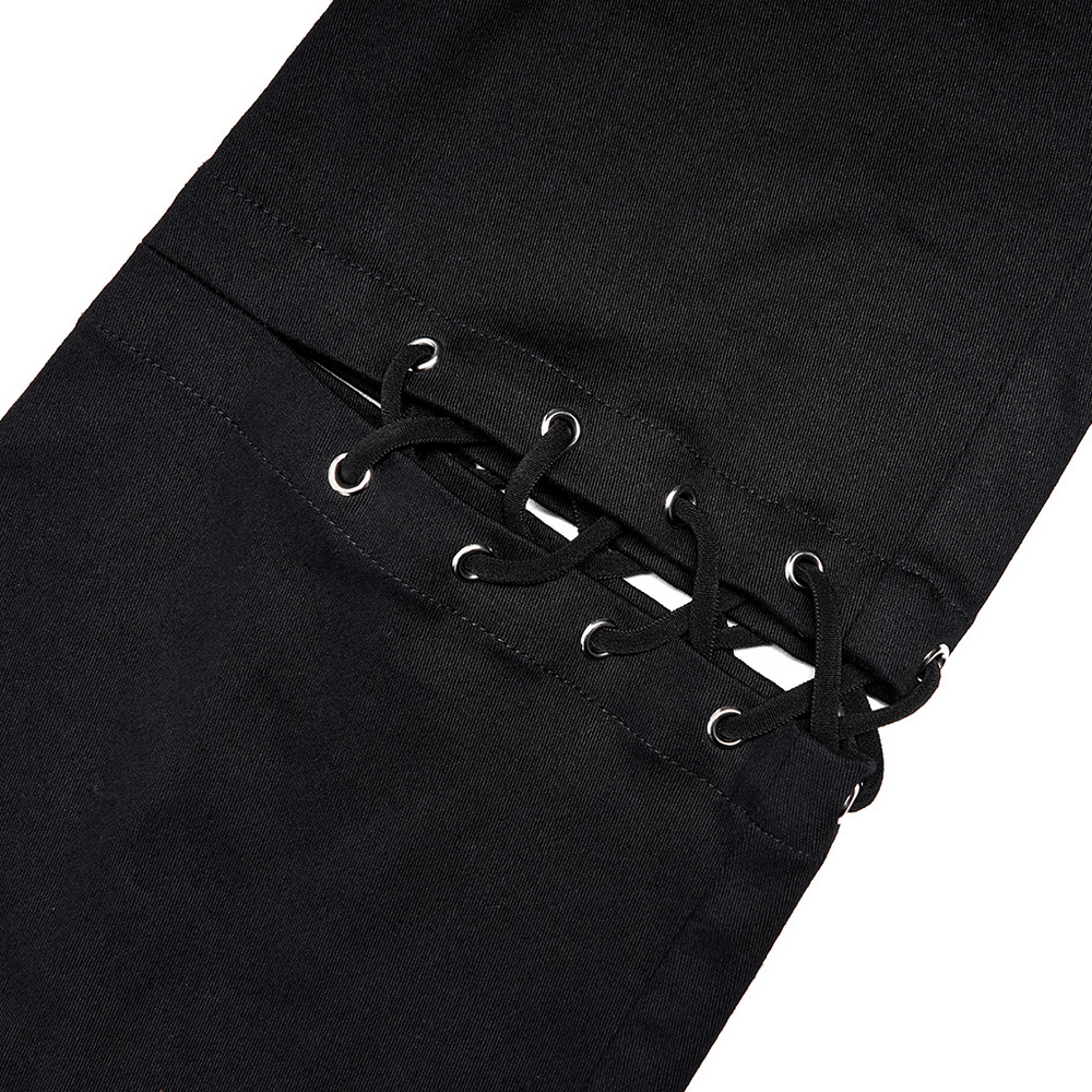 Close-up of crimped detail on black punk flared pants, showcasing unique laced design and stylish craftsmanship.