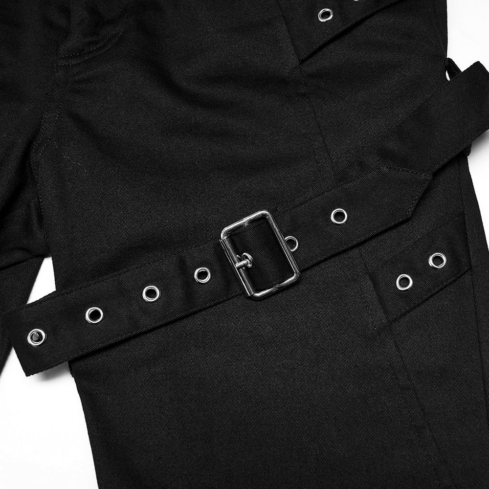 Close-up of removable belt and crimp detailing on black punk flared pants.