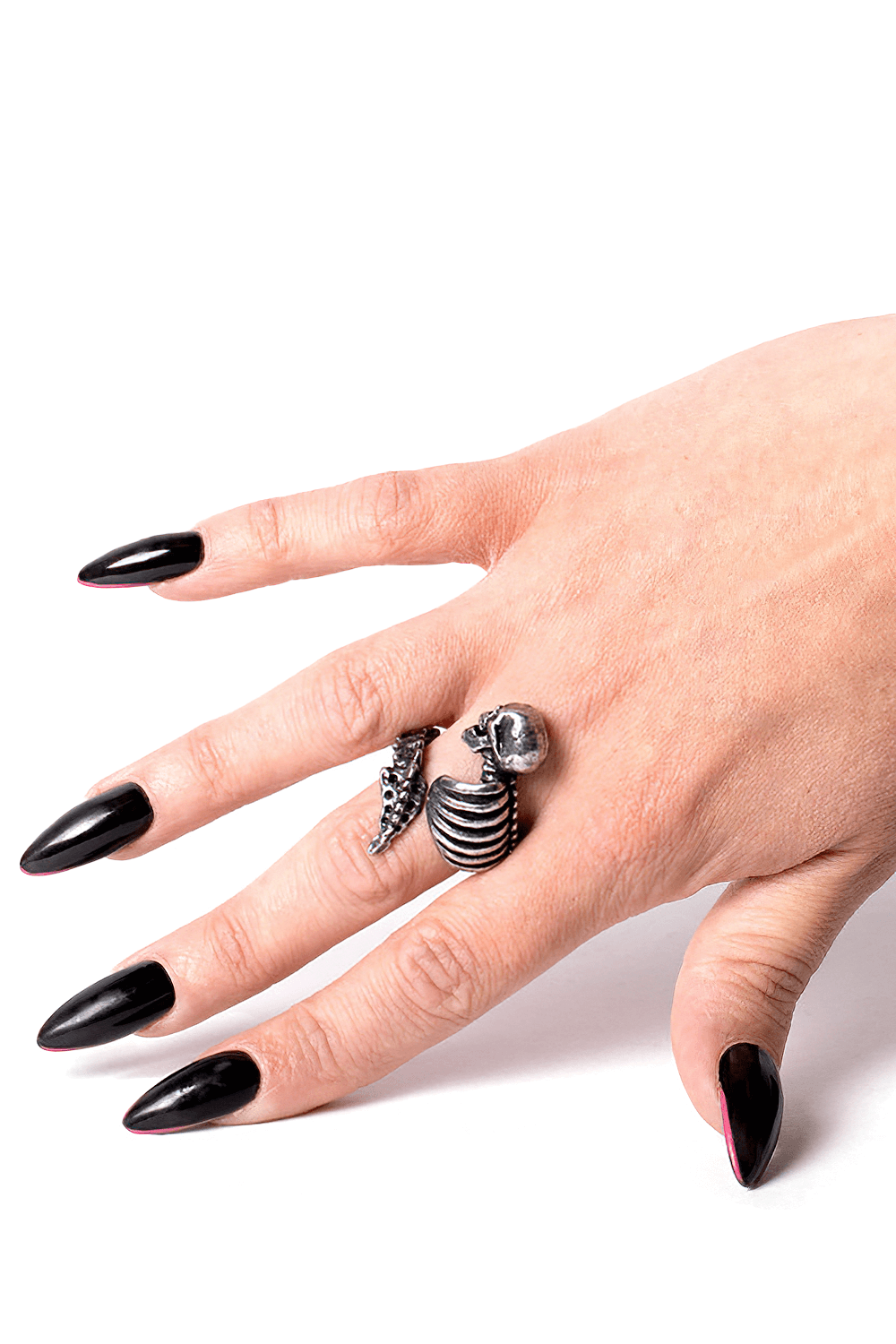 Gothic Skeleton Rib Cage Ring on a hand with black nails, showcasing its antique pewter design and adjustable fit.