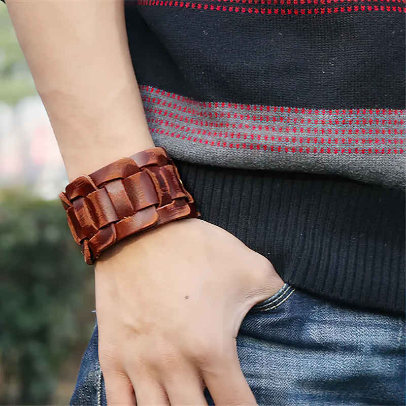 Retro genuine leather wristband worn with a stylish outfit - perfect alternative accessory for denim looks.