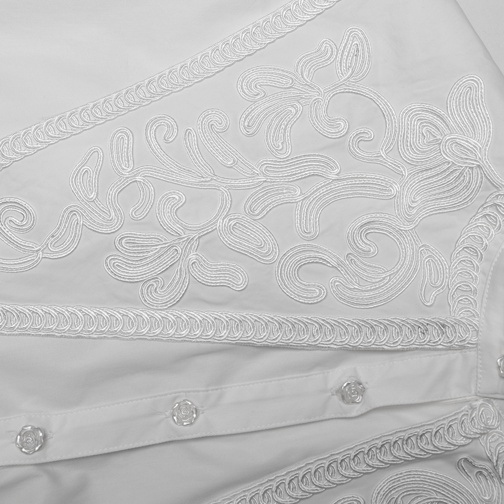 Close-up of embroidered lace detailing on a Retro Gothic White Ruffled Shirt, showcasing elegant floral patterns.