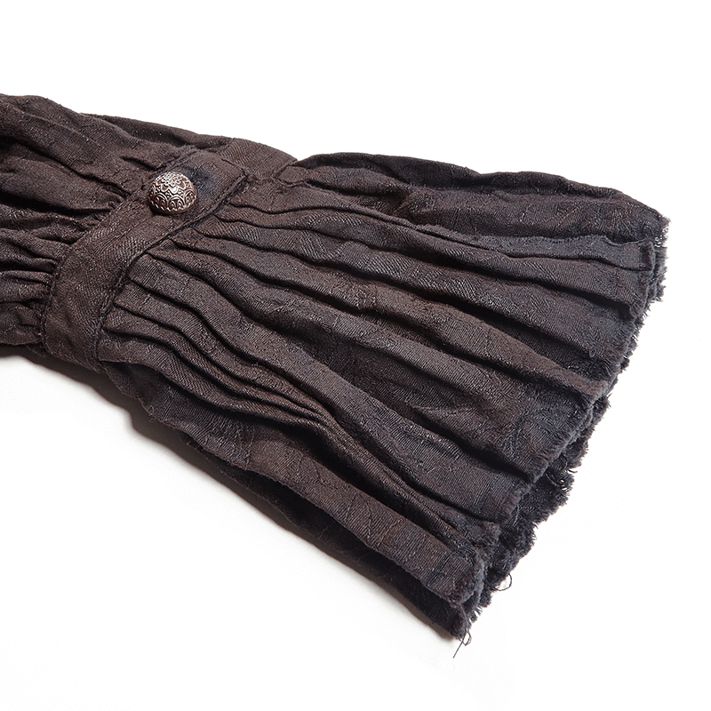 Close-up of pleated black linen cuff from a Victorian-inspired steampunk shirt for men.