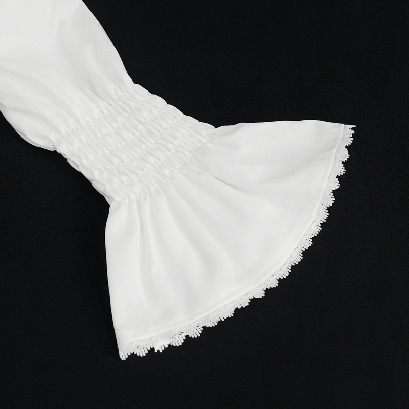 Close-up of the flared cuff and ruffles on a white gothic blouse, showcasing vintage-inspired design details.