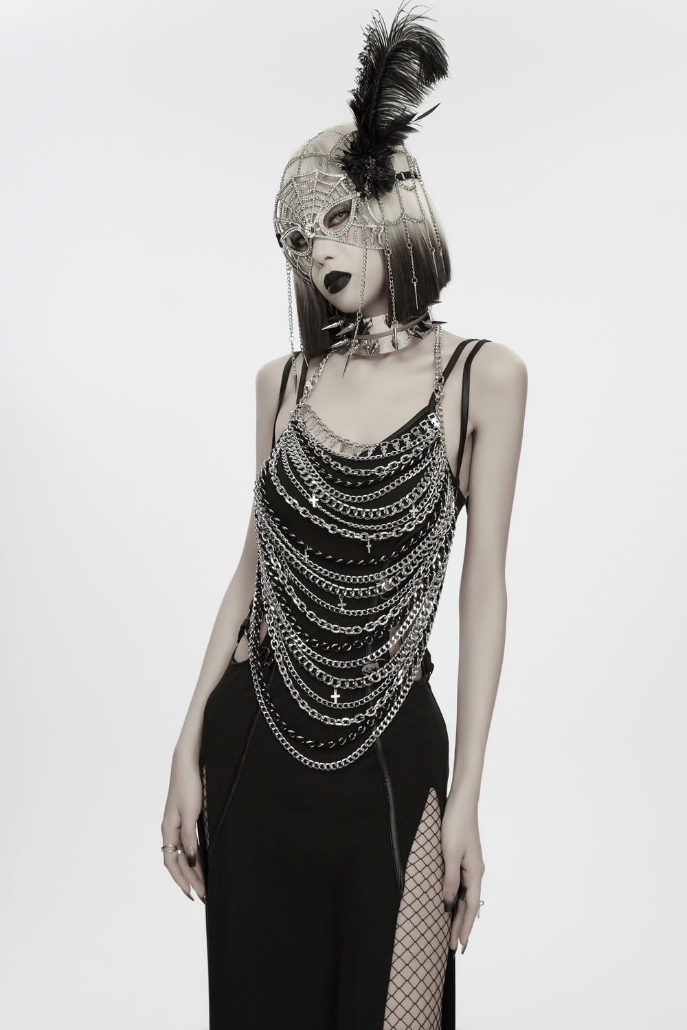 Stunning model showcasing Rhinestone Spider Web Feather Chain Masquerade Mask with chains and feathers for a gothic look.