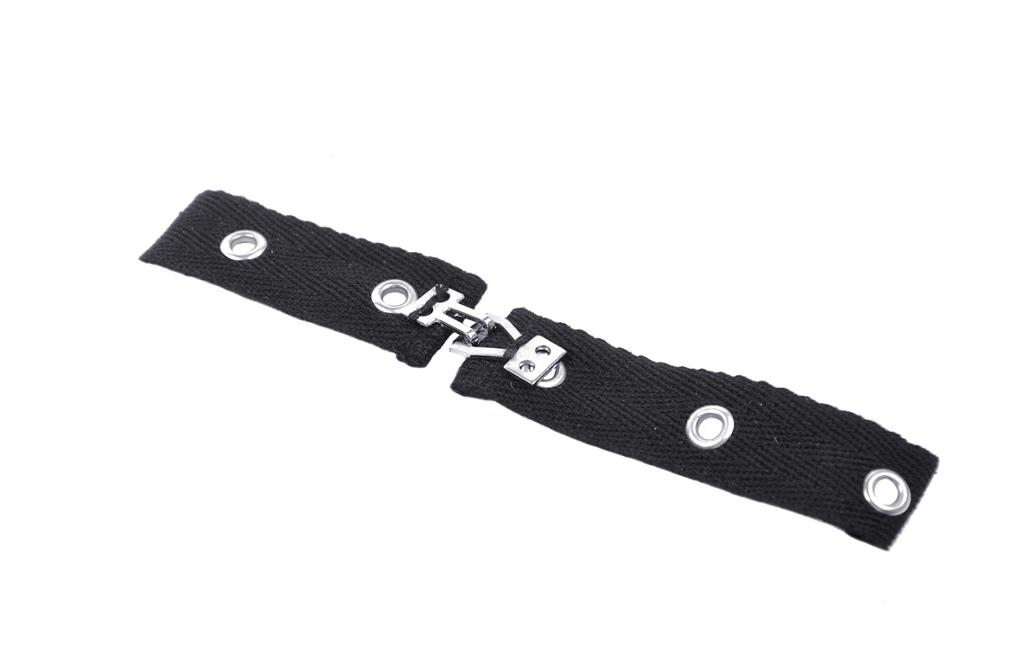 Black fabric strap with metal clasps and eyelets, perfect for edgy fashion accessories and DIY projects.
