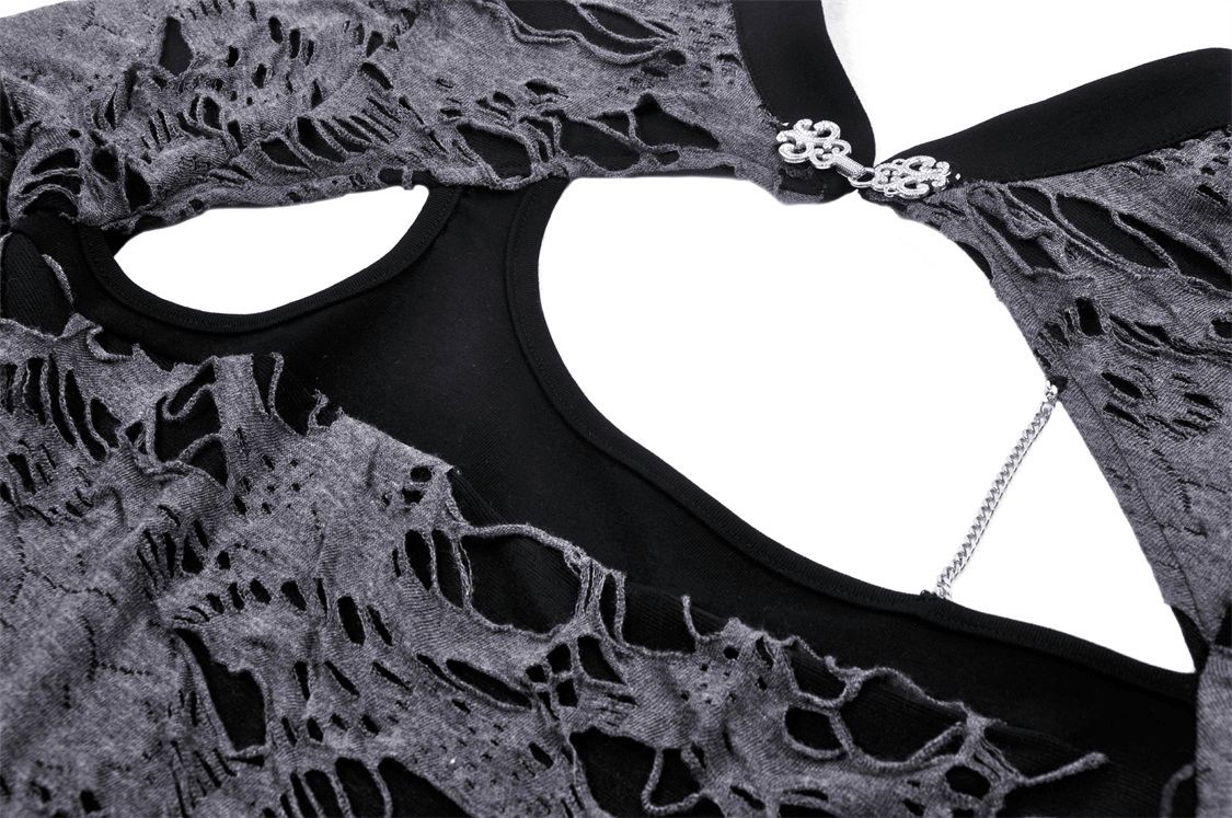 Close-up of a ripped mesh long-sleeved top featuring edgy black mesh and striking metal eyelets, perfect for a bold look.