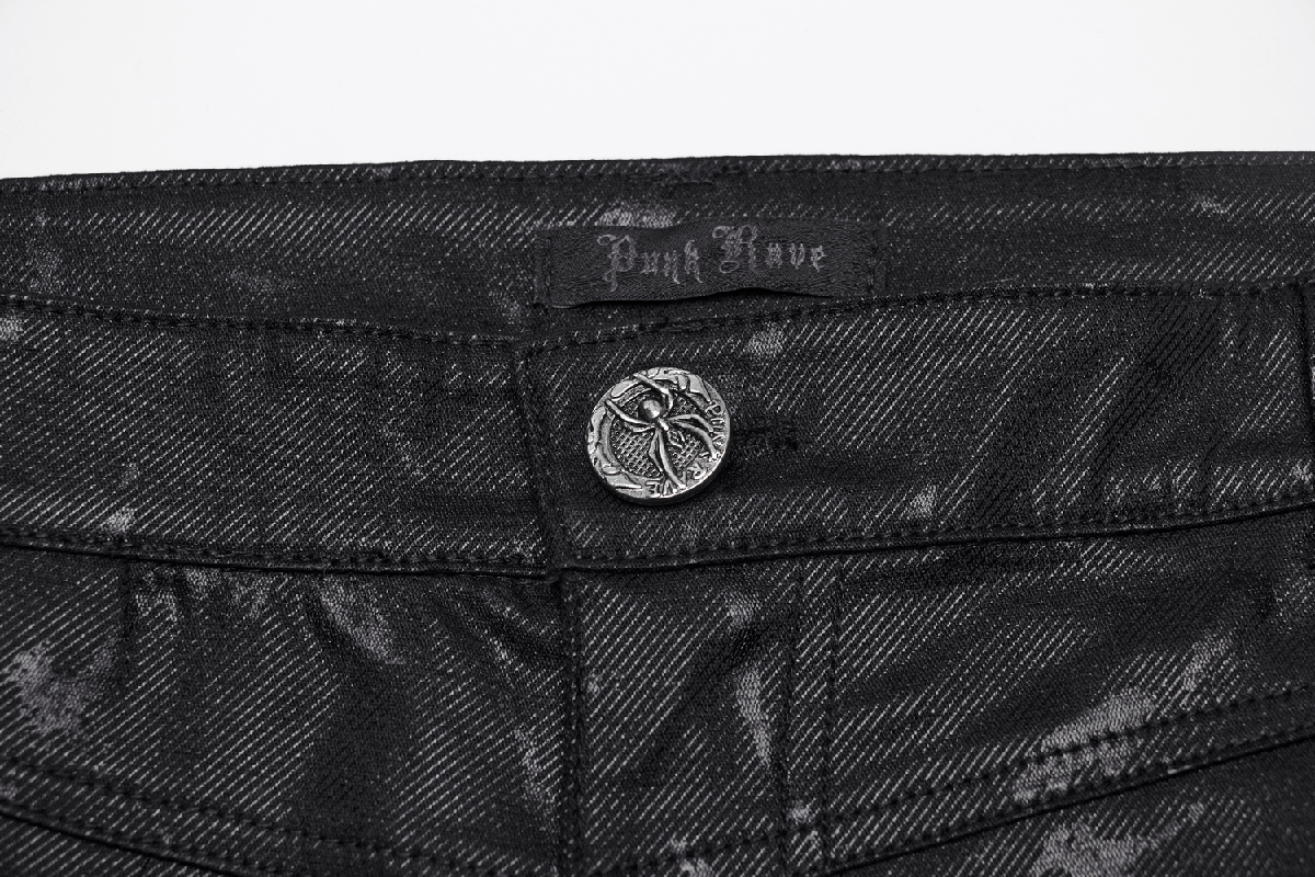 Close-up of the Punk Rove jeans waistband featuring a unique button and edgy black fabric.