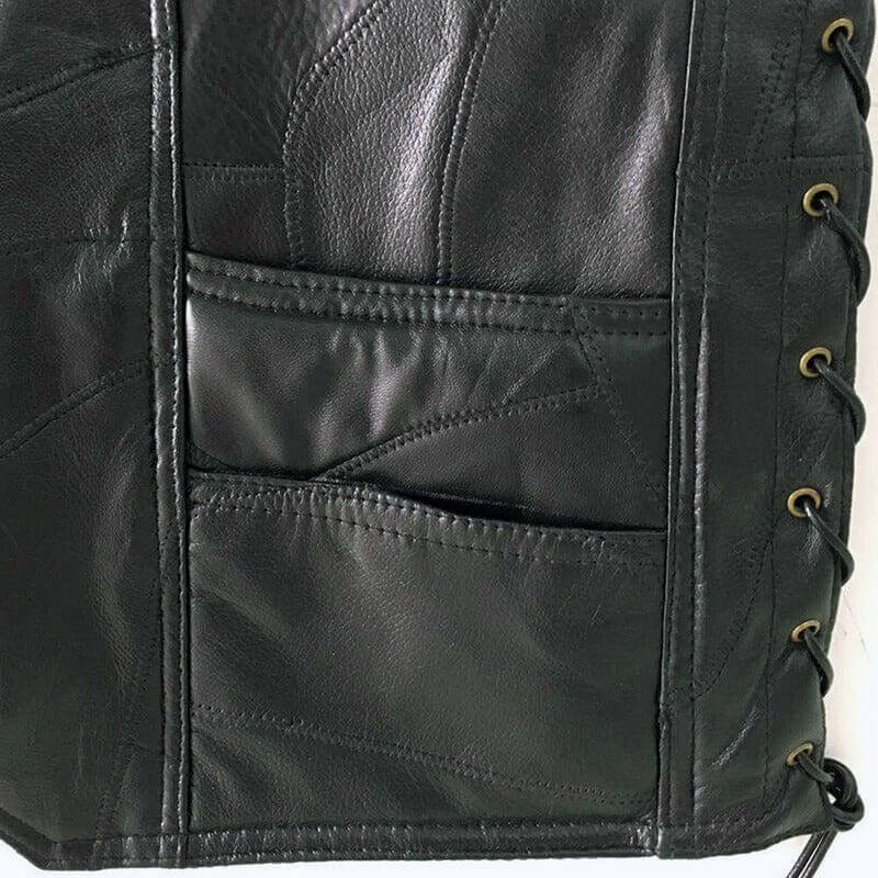 Close-up of black leather vest showcasing detailed stitching and pockets for a rock style look.