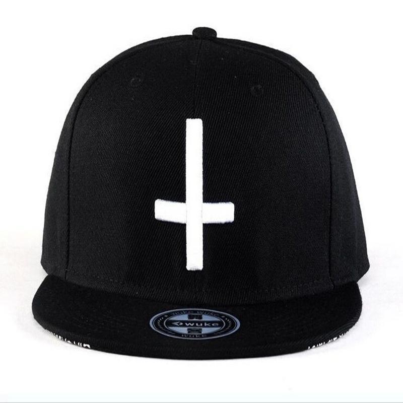 Rock style black snapback baseball cap with white cross embroidery, perfect for rocking out at events.