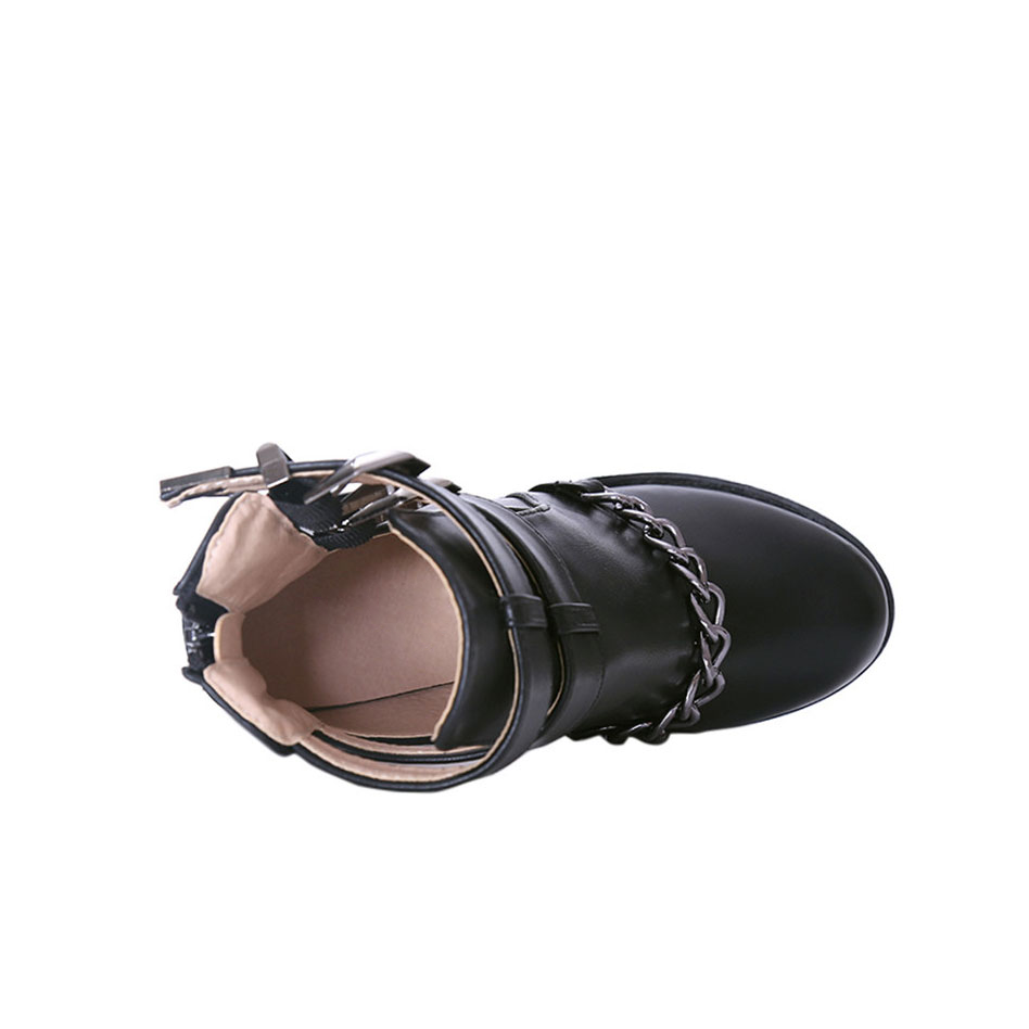 Top view of black high heel boots featuring round toe, thick platform, and stylish chain accents.