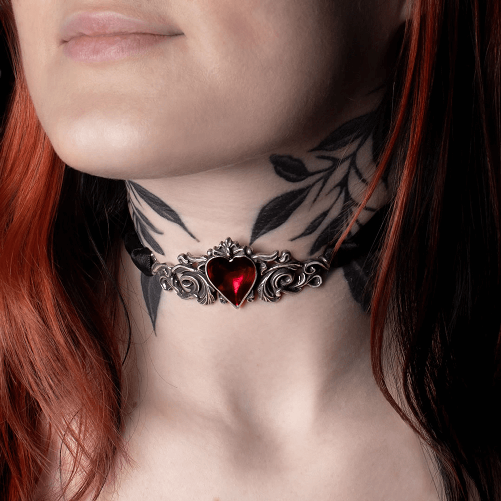 Romantic Gothic choker with red heart pendant, showcasing baroque lace and ornate pewter design for a dramatic flair.