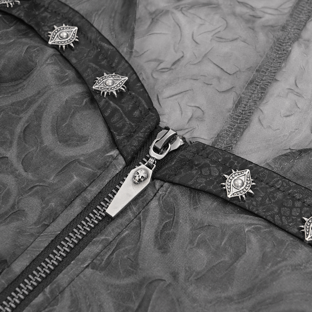 Close-up of dark mesh blouse zipper with metallic grommet details for a gothic touch.