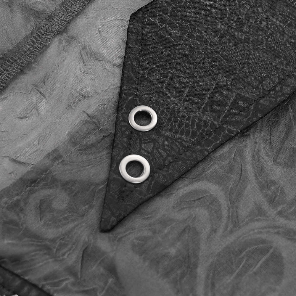 Close-up of black lace-up detail with metal grommets on a sheer gothic blouse, showcasing edgy elegance.