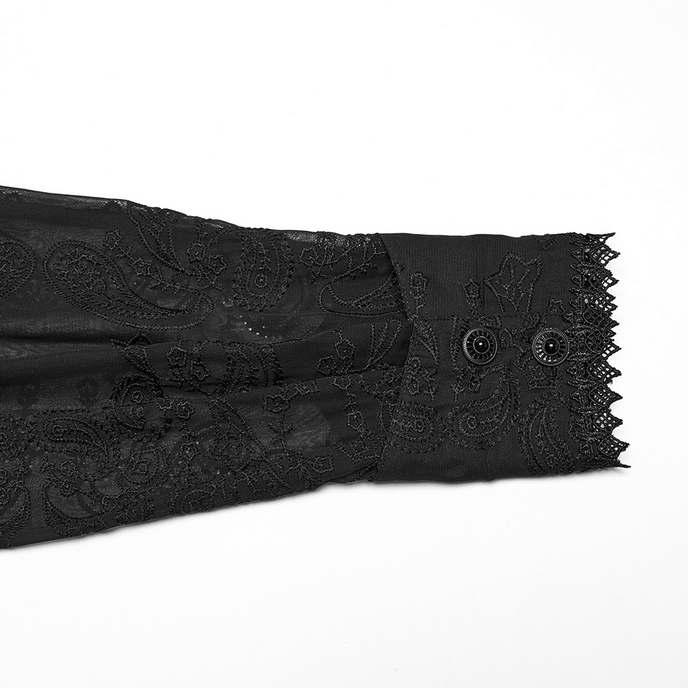 Detail of goth romantic chiffon shirt sleeve, featuring embroidered cashew flower pattern and lace accents.