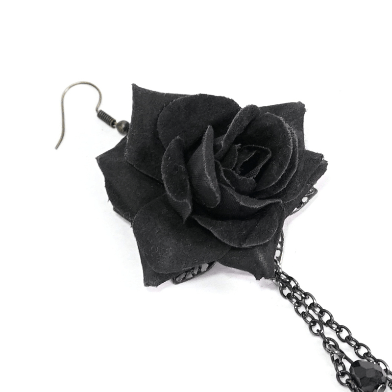 Black rose earrings with chains in gothic style for women, perfect alternative fashion jewelry.