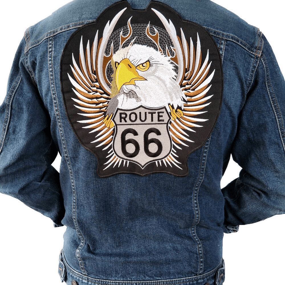 Large Route 66 embroidered eagle patch on a denim jacket, perfect for biker style and alternative fashion.