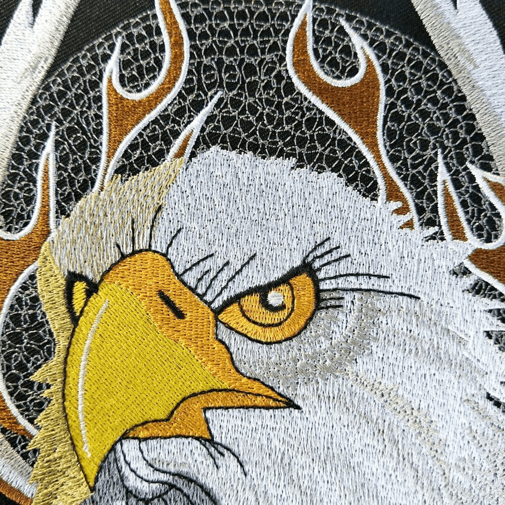 Detailed embroidered eagle patch with vibrant colors, perfect for jackets and bags in an alternative style.
